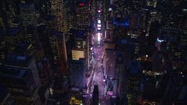 5.5K aerial stock footage orbit Times Square and high-rises at Night in Midtown, New York City Aerial Stock Footage | AX121_133E