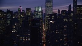 5.5K aerial stock footage of Midtown city canyons at Night in New York City Aerial Stock Footage | AX121_147