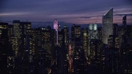 5.5K aerial stock footage of 432 Park Avenue and Citigroup Center skyscrapers at Night in Midtown, New York City Aerial Stock Footage | AX121_148E