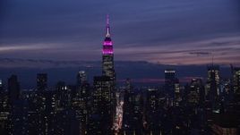 5.5K aerial stock footage of Empire State Building and streets at Night in Midtown Manhattan, New York City Aerial Stock Footage | AX121_152
