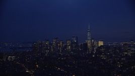 5.5K aerial stock footage approach Lower Manhattan skyline at Night in New York City Aerial Stock Footage | AX121_153E