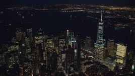 5.5K aerial stock footage approach high-rises in Lower Manhattan at Night in New York City Aerial Stock Footage | AX121_178