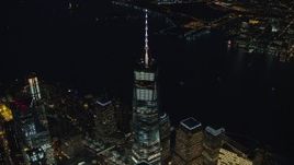 5.5K aerial stock footage of approaching top of Freedom Tower at Night in New York City Aerial Stock Footage | AX121_179E