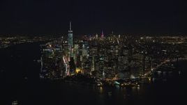 5.5K aerial stock footage orbit the tip of Lower Manhattan at Night in New York City Aerial Stock Footage | AX121_193E