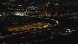 5.5K aerial stock footage orbit heavy traffic on New Jersey Turnpike at Night Aerial Stock Footage | AX121_197