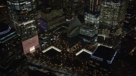 5.5K aerial stock footage orbit World Trade Center Memorial, Lower Manhattan at Night in New York City Aerial Stock Footage | AX122_045E