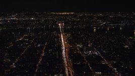 5.5K aerial stock footage of heavy traffic on Delancey Street to Williamsburg Bridge at Night, Lower East Side, NYC Aerial Stock Footage | AX122_050E