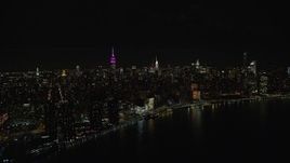 5.5K aerial stock footage orbit Midtown Manhattan skyscrapers at Nighttime in NYC Aerial Stock Footage | AX122_076E