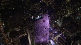 5.5K aerial stock footage approach Rockefeller Center at Night in Midtown Manhattan, New York City Aerial Stock Footage | AX122_122E