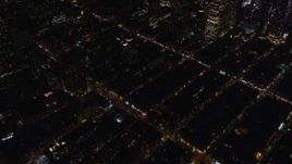 5.5K aerial stock footage orbit city streets in Hell's Kitchen at Night in Midtown Manhattan, New York City Aerial Stock Footage | AX122_128