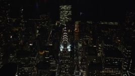 5.5K aerial stock footage orbit top of Chrysler Building at Night in Midtown, NYC Aerial Stock Footage | AX122_139E