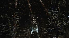 5.5K aerial stock footage of orbiting the top of the Chrysler Building at Nighttime in Midtown, New York City Aerial Stock Footage | AX122_160E
