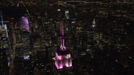 5.5K aerial stock footage orbit the Empire State Building and zoom wider at Night, Midtown Manhattan NYC Aerial Stock Footage | AX122_167E