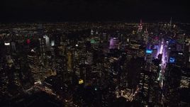 5.5K aerial stock footage of Midtown skyscrapers and famous Times Square at Night in NYC Aerial Stock Footage | AX122_182E