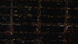 5.5K aerial stock footage of a bird's eye of city streets in Chelsea, New York City at Night Aerial Stock Footage | AX122_192E