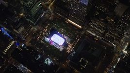 5.5K aerial stock footage of a bird's eye of ice rink at Bryant Park at Night in Midtown, New York City Aerial Stock Footage | AX122_196