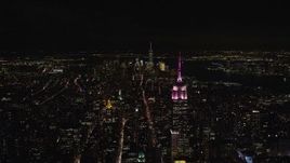 5.5K aerial stock footage of the Empire State Building and Lower Manhattan at Night in New York City Aerial Stock Footage | AX122_211E