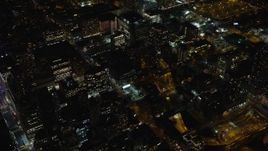 5.5K aerial stock footage of apartment and office buildings in Midtown Manhattan, New York City at Night Aerial Stock Footage | AX122_214