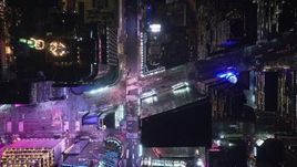 5.5K aerial stock footage of a bird's eye view of 42nd Street revealing Times Square at Night, Midtown Manhattan, NYC Aerial Stock Footage | AX122_224E