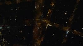 5.5K aerial stock footage of a bird's eye view of Avenue of the Americas at Night in Soho, New York City Aerial Stock Footage | AX122_247