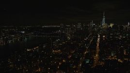 5.5K aerial stock footage orbit Manhattan Bridge and Lower Manhattan at Night in New York City Aerial Stock Footage | AX122_256E