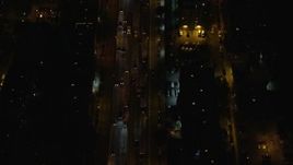 5.5K aerial stock footage of a bird's eye of light traffic on Brooklyn Queens Freeway at Night in New York City Aerial Stock Footage | AX122_265E