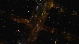 5.5K aerial stock footage of a bird's eye view of a bus on a Harlem Street at Night in New York City Aerial Stock Footage | AX123_041