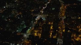 5.5K aerial stock footage approach an intersection in Harlem at Night in NYC Aerial Stock Footage | AX123_042