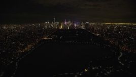 5.5K aerial stock footage fly over Central Park and approach Midtown Manhattan at Night in New York City Aerial Stock Footage | AX123_052E