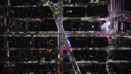 5.5K aerial stock footage of a bird's eye of 6th Avenue and Broadway at Night in Midtown, New York City Aerial Stock Footage | AX123_066E