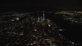 5.5K aerial stock footage of a slow approach to Lower Manhattan at Night in New York City Aerial Stock Footage | AX123_072E
