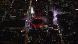 5.5K aerial stock footage of orbiting Madison Square Garden at Night in Midtown, New York City Aerial Stock Footage | AX123_077