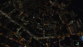 5.5K aerial stock footage of a bird's eye of Lower Manhattan streets and towers at Night in New York City Aerial Stock Footage | AX123_086