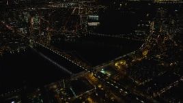 5.5K aerial stock footage orbit of the Brooklyn and Manhattan Bridges at Night in New York City Aerial Stock Footage | AX123_090E