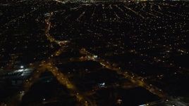 5.5K aerial stock footage of suburban neighborhoods at Night in Jamaica, New York Aerial Stock Footage | AX123_142