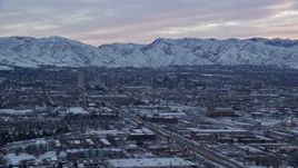 5.5K aerial stock footage approach Downtown Salt Lake City, Utah, at Sunrise in Winter Aerial Stock Footage | AX124_003
