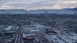 5.5K aerial stock footage fly over power plant near Downtown Salt Lake City, Utah, at Sunrise in Winter Aerial Stock Footage | AX124_004E
