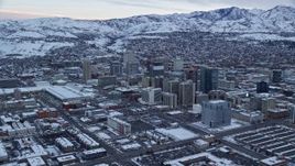5.5K aerial stock footage of buildings in Downtown Salt Lake City, Utah at Sunrise in Winter Aerial Stock Footage | AX124_011E