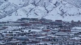 5.5K aerial stock footage of University of Utah Hospital at Sunrise in Winter, Salt Lake City Aerial Stock Footage | AX124_016E