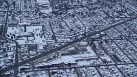 5.5K aerial stock footage fly over strip mall and Salt Lake City neighborhoods at Sunrise in Winter in Utah Aerial Stock Footage | AX124_018