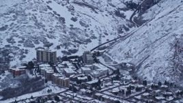 5.5K aerial stock footage of apartment buildings at Sunrise in Salt Lake City, Utah in Winter Aerial Stock Footage | AX124_020E