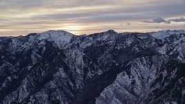 5.5K aerial stock footage approach snowy mountains in Wasatch Range at Sunrise in Utah Aerial Stock Footage | AX124_033E