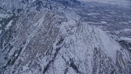5.5K aerial stock footage approach snowy Mount Olympus at winter sunrise in Wasatch Range, Utah Aerial Stock Footage | AX124_042E