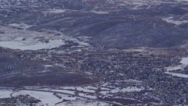 5.5K aerial stock footage of rural homes with winter snow in Park City at sunrise in Utah Aerial Stock Footage | AX124_090E