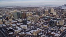 5.5K aerial stock footage approach wintery Downtown Salt Lake City, Utah with snow at sunrise Aerial Stock Footage | AX124_195E