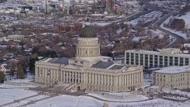 5.5K aerial stock footage of Utah State Capitol with winter snow at sunrise in Salt Lake City Aerial Stock Footage | AX124_198E