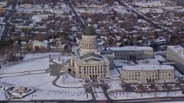 5.5K aerial stock footage of orbiting the Utah State Capitol with winter snow in Salt Lake City at sunrise Aerial Stock Footage | AX124_200E