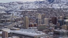 5.5K aerial stock footage of Downtown Salt Lake City and Utah State Capitol with winter snow at sunrise Aerial Stock Footage | AX124_227