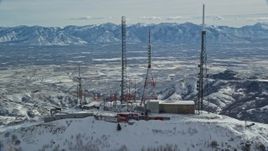 5.5K aerial stock footage orbit radio transmission towers on Farnsworth Peak with winter snow, Utah Aerial Stock Footage | AX125_136