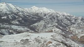 5.5K aerial stock footage of snowy Farnsworth and Kessler Peaks in winter, Utah Aerial Stock Footage | AX125_282